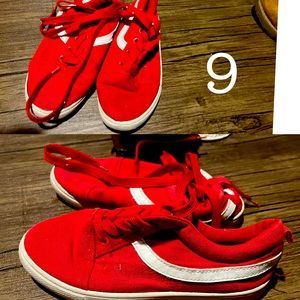 They are red kids vans. Only worn once. To small.